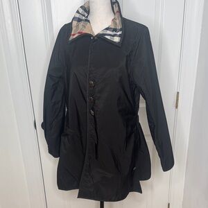 Button up and Reversible  Wind Resistant Jacket Inspired styling.